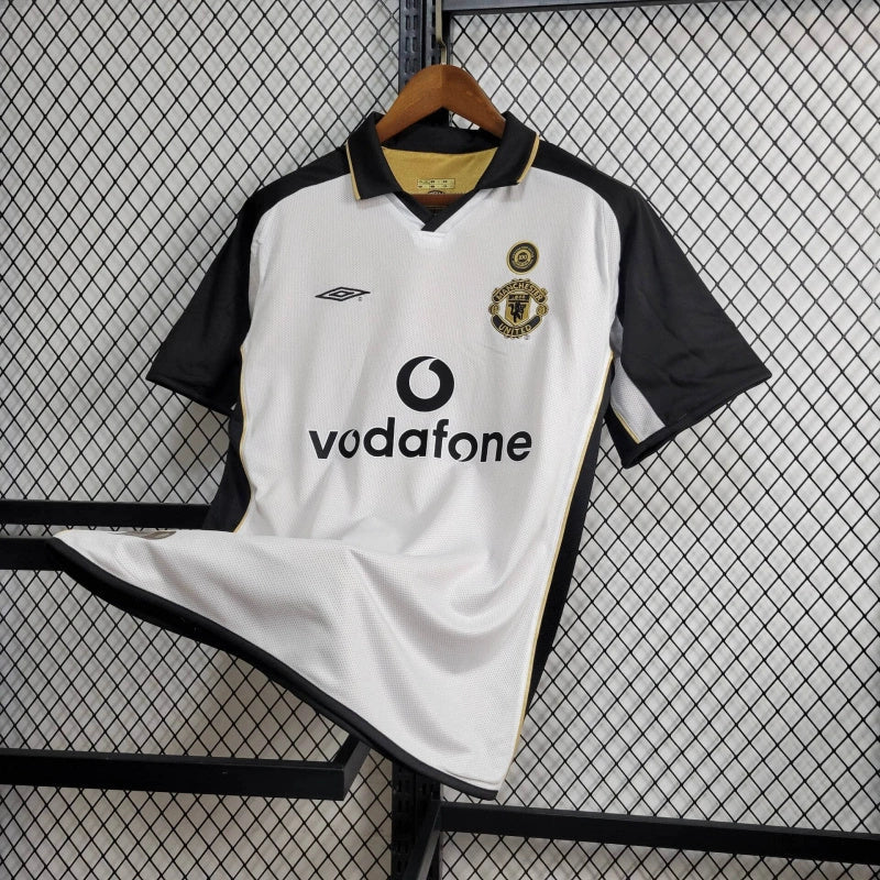 Camisa Pronta Entrega Manchester United Dupla Face 2001/02 - Umbro Retrô Masculina - Edição Especial 100 anos - Dourada/Branca
