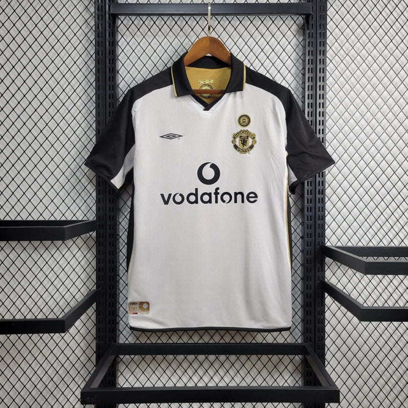 Camisa Pronta Entrega Manchester United Dupla Face 2001/02 - Umbro Retrô Masculina - Edição Especial 100 anos - Dourada/Branca